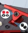 Rad 90A PU Longboard Skateboard Bushings Rebuild Kit With Washers And Pivot Cups Red shown with truck parts on surface