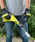 Person using 18V ONE Plus Cordless Edger Bare Tool With 22cm Serrated Edging Blade, Four Position Height Adjustment outdoors