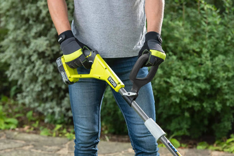 Person using 18V ONE Plus Cordless Edger Bare Tool With 22cm Serrated Edging Blade, Four Position Height Adjustment outdoors