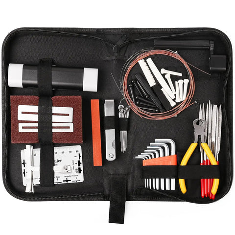 72 Piece All In One Guitar Tool Kit For Repair And Maintenance with carry bag, bridge pins, strings, files, wrenches visible