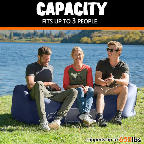Three people sitting on Inflatable Lounger Beach Chair With Air Sofa Hammock For Camping And Backyard Hangout Ready Quick Inflate No Pump Needed Portable Couch By Lakeside, showing 650 lb capacity.