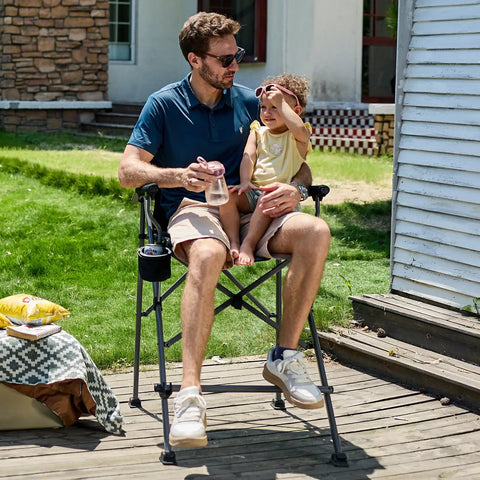 Man and child sitting on Tall Camping Directors Chair With Cup Holder 31 Inch Bar Height Folding Chair For Outdoors