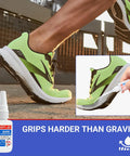 Heavy Duty Shoe Glue For Sole Repair That Delivers A Super Strong Bond For Rubber Boots Sneakers Leather Sandals And High Heels Tough As Nails Built To Last Waterproof Quick Dry Flexible And Clear Adhesive bottle next to repaired sneaker.