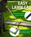 Person using Heavy Duty 36x12 Inch Lawn Leveling Rake With Stainless Steel Build And Adjustable 78 Inch Handle For Yardwork