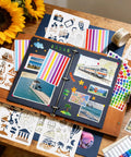 Badass Vintage Leather Scrapbook Album With Sixty Pages Memory Book And Hella Cute Travel Journal Kit For DIY Photo Keepsakes And Totally Sweet Anniversary Gifts Featuring Metal Rivet Binding And Complete Craft Supplies Inside showing colorful stickers and decorated pages.
