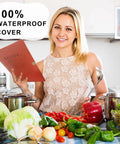 Woman holding Leather Recipe Book With Index Pages And Templates, preparing food, showing cookbook with waterproof cover.