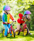 Children riding bikes wearing All Ages Kids Helmet For Boys And Girls Lightweight Ventilated Safety Gear For Bike Scooter Inline Skates