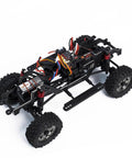 Badass 1/18 Scale RC Crawler With Slick Shifting Two Speed Transmission And Bulletproof Metal Gears Nasty Terrain Rock Climbing Rig chassis with electronics.