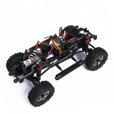 Badass 1/18 Scale RC Crawler With Slick Shifting Two Speed Transmission And Bulletproof Metal Gears Nasty Terrain Rock Climbing Rig chassis with electronics.