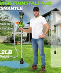 Person holding Beast Cordless Stick Water Transfer Pump 21V Battery 13,800 RPM 720 GPH Flow in garden setting