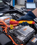 Heavy Duty 3/8 Inch Drive VDE Insulated Ratchet Wrench With 72 Tooth Gears For High Voltage Electrical And Hybrid Car Jobs Built Tough As Nails Using Chrome Vanadium Steel in use on an electric vehicle.