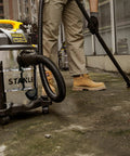 Pro Grade 6 Gallon Wet Dry Vacuum With 4 Peak HP Motor And Stainless Steel Tank In Silver And Yellow used for sidewalk cleanup