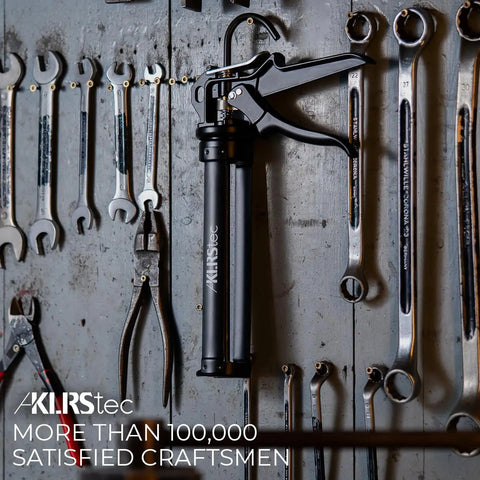Heavy Duty Caulking Gun With Twenty Five To One Thrust Ratio For Standard Ten Ounce 300ml Cartridges hanging on tool wall.