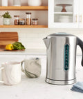 Soft Top Pure Hot Water Kettle With Easy Pour, Soft Grip Handle, 7 Cup Capacity, Brushed Stainless Steel on kitchen counter