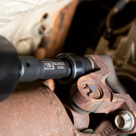 Limited Clearance 1/2 Inch Drive Socket Set in use on automotive part, Cr-Mo steel, showing radius corner design for less wear