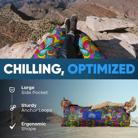 Person relaxing on No Pump Setup Inflatable Couch Lounger with fun psychedelic print, durable ripstop polyester, in a scenic canyon.