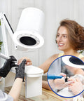 Game Changing Nail Dust Extractor With Bright Dimmable Led Lamp and Tunable Suction Power showcasing use in a beauty setting.