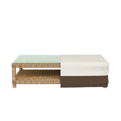 Outdoor Patio Coffee Table Cover All Weather Protection Waterproof And UV Resistant With Secure Straps Beige Tan 48 By 28 Inches Durable Woven Polyester Keeps Rain Snow Dust Out over a wicker table.