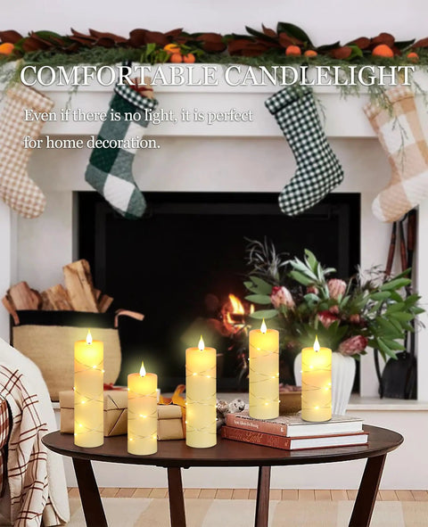 Flickering Flameless Candles With Embedded String Lights, Battery Operated 5 Pack Ivory on coffee table by fireplace