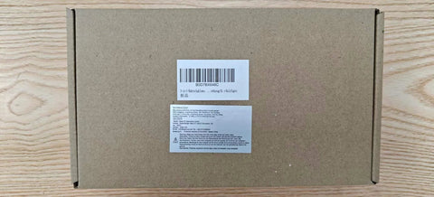 Brown packaging box labeled for Pro Grade Pocket Hole Jig Kit With Metal Construction And Adjustable Drill Guides For 15 Degree Holes.