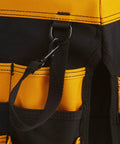 Close-up of black and yellow In And Out Bucket With 61 Pockets 36 Exterior Triple Row Pockets And 25 Interior Pockets Heavy Duty Tool Organizer.