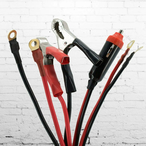 Heavy Duty 900W Peak Power Inverter Converts Dc 12V To Ac 110V showing cables and clips for easy connectivity.