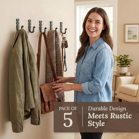 Heavy Duty Kickass Cast Iron Wall Hooks 5 Pack Handmade Blacksmith J Hooks in use, holding coats and bags indoors.