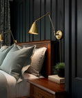 Ellis 18 Inch Vintage Industrial Swing Arm Wall Lamp With Adjustable Head Set Of Two Dope Modern Look Plug In Or Wall Mount Cord Covers Oil Rubbed Bronze Finish Conic Metal Shade For Living Room Bedroom over a bed in elegant setting.
