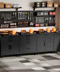 Heavy Duty Metal Rolling Tool Cabinet With Pegboard And 10 Hooks, Beefy Mechanics Tool Chest For Workshop, Basement Or Warehouse, Includes Workbench Liner, Black, with organized tools and helmets on top.