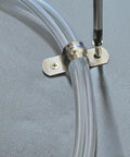 100 Pack 2 Hole 3 Quarter Inch Rigid EMT Pipe Straps, Heavy-Duty Zinc-Plated Steel Clips With Reinforced Rib installed on tube