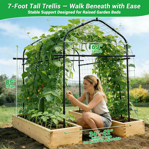 Woman tending to plants under a tall garden arch trellis for climbing plants, 7 ft metal walk-through archway with adjustable base