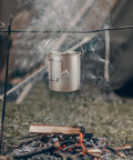 Pure Titanium 750ml Camping Pot With Spork Kit for solo backpacking hanging over campfire, food-grade, lightweight, durable.