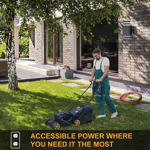 Outdoor Dusk To Dawn Light With Built In GFCI Outlet next to person mowing lawn with powered garden tool