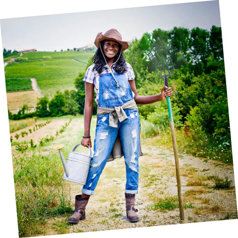 Person holding Versatile Grass Fork For Farm And Garden, Durable Manure Forks Easy To Use For Grassland Cleanup, lawn in background