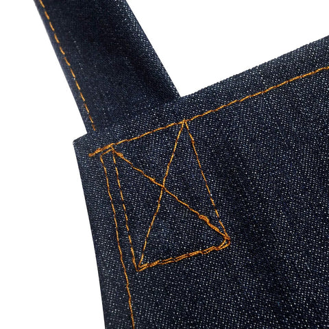 Close-up of stitching on Denim Tool Apron With Four Pockets Waterproof Adjustable Canvas Lightweight Work Apron Blue For Crafts