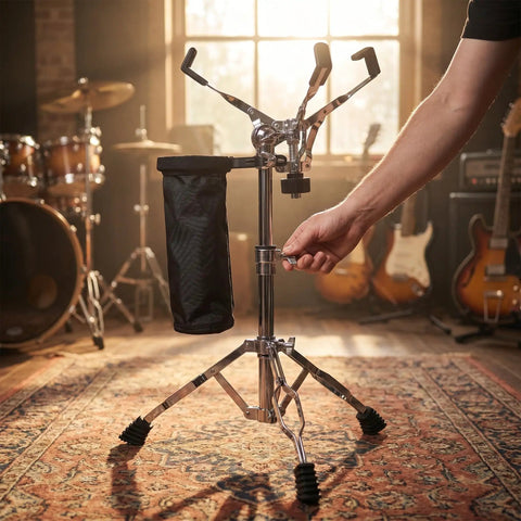 Pro Level Adjustable Snare Drum Stand With Heavy Duty Double Braced Tripod Base For 10 To 14 Inch Pads being adjusted in a studio.