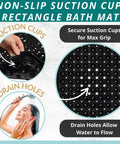 Extra Long Non Slip Bath Mat With Built Tough Suction Cups That Hold Fast On Wet Tub And Shower Floors Heavy Duty Anti Skid Safety Runner Strip In Matte Black 40X16 with suction cups and drain holes.