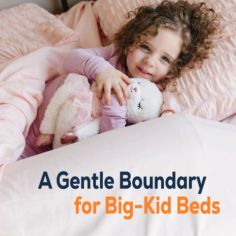 Child sleeping safely on bed with On-The-Go Toddler Bed Rails Two-Pack Inflatable Bumpers, cozy and snug at night.