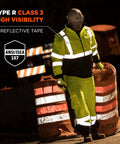 Worker wearing Hi Vis Lime GloWear Type R Class 3 Quilted Bomber Jacket Insulated 160g at night on construction site.