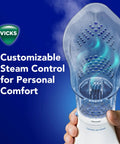 Plug In Non Medicated Steam Inhaler For Sinus Relief And Congestion with customizable steam control in hand
