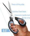 Hand holding Premium Tailor Scissors 9.5 Inch Heavy Duty Stainless Steel For Fabric, Sewing, Quilting And Alterations With Ergonomic Soft Grip Handle