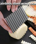 Handheld French fry slicer with stainless steel wavy blade; large crinkle cutter for potatoes.