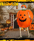 12 Ft Skeleton Costume Accessories Set With Pumpkin Hat Pumpkin Shaped Clothes And Handheld Fabric Basket For Giant Halloween Outfit And Outdoor Party Prop in front of decorated house