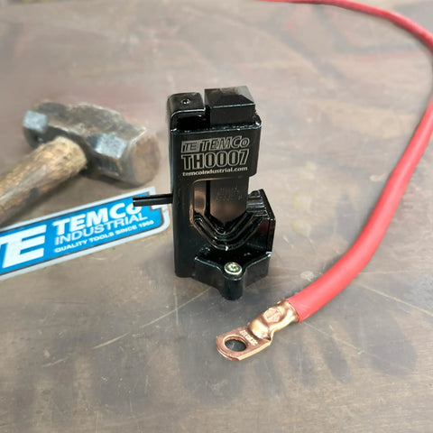 Hammer Lug Crimper Tool For Battery And Welding Cables Crimps 8 AWG Through 4/0, hammer and cable on bench