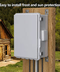 Tough As Nails Electrical Junction Box With Ventilated ABS Housing And Integrated Cable Grommets Weather Sealed IP65 Hinged Door mounted on a wooden post.
