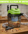 Heavy Duty 1.5 Gallon Wet And Dry Shop Vacuum Cleaner With 2.5 Peak Hp Motor picking up debris on a kitchen counter.