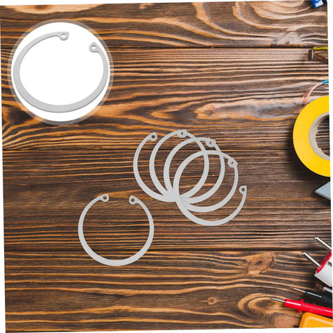 Stainless Steel C Clip Set 5 Pack With Grooved Retaining Rings displayed on wooden surface for DIY and pro projects