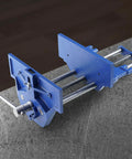 Beast Mode Heavy Duty Cast Iron Workbench Vise With Quick Release Lever 13 Inch, blue vice mounted on metallic surface.