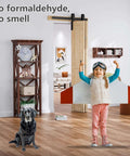 Living room showcasing No Assembly Bi Fold Barn Door Set 30x84 with 36 Inch Hardware Kit, child playing, dog nearby, and decor shelves.