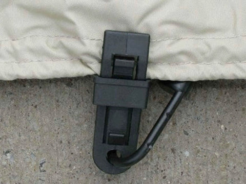 Close-up of black Adjustable Patio Cover Clips With Elastic Bungee Cords Windproof Tie Down System securing a beige cover.